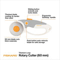 Fiskars 60mm Rotary Cutter for Fabric with Ergonomic Loop Grip And Comfort Handle, Titanium Rotary Fabric Cutter for Thick Materials, Easy and Safe Blade Change, Sewing Supplies and Quilting Tools